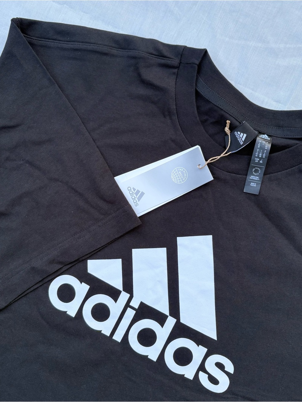 adidas Black Short Sleeve Tee with White Trefoil-Style Logo